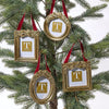 Gold picture frame ornaments on a Christmas tree