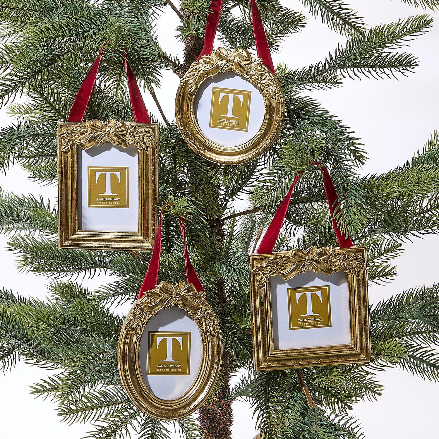 Gold picture frame ornaments on a Christmas tree