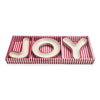Decorative tray with 'JOY' letters on a red and white striped background