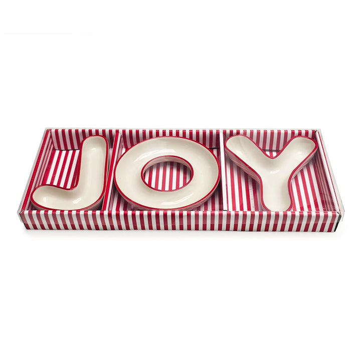 Decorative tray with 'JOY' letters on a red and white striped background