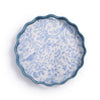 Decorative plate with blue floral and bird pattern on a white background