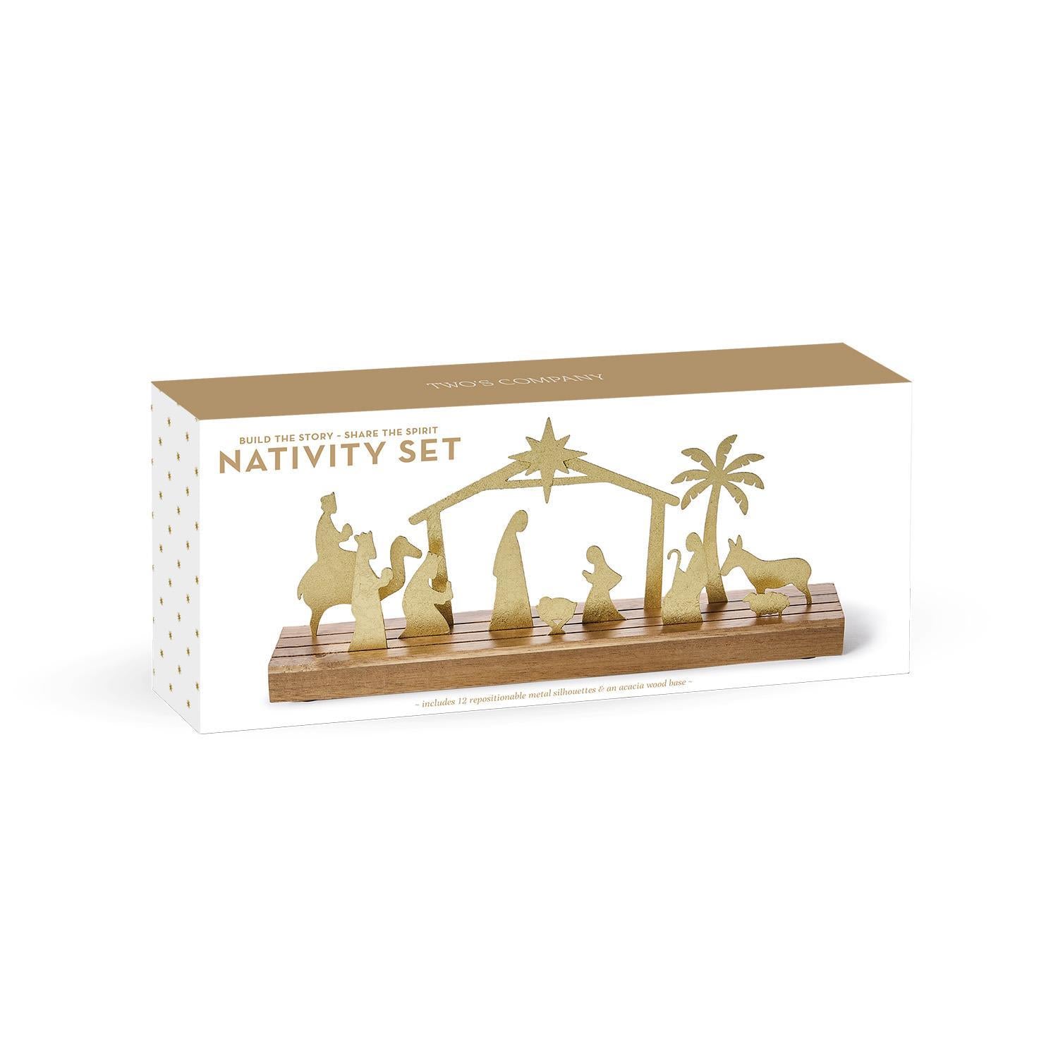 Nativity set with wooden stand and gold figures in packaging on a white background