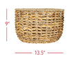 Woven basket with dimensions indicated on a white background