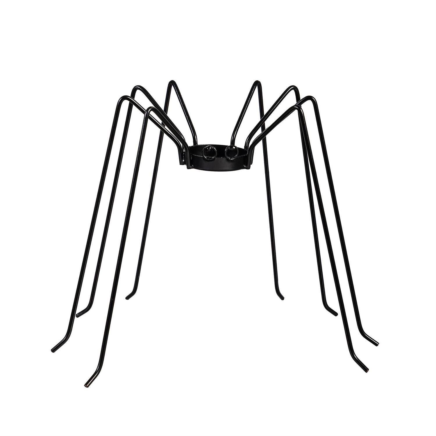 Black spider-shaped candle holder on a white background
