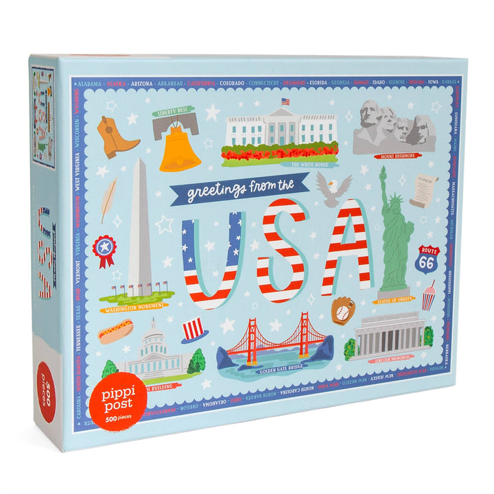 Puzzle box with illustrations of USA landmarks and 'greetings from the USA' text.