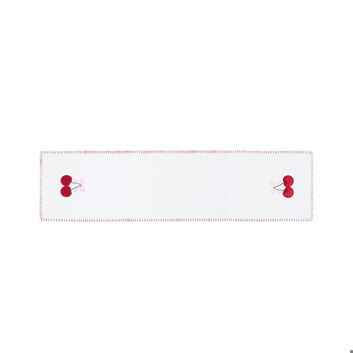 A white rectangular table runner with a dashed red border and two small red cherry motifs at each end, shown on a plain white background.
