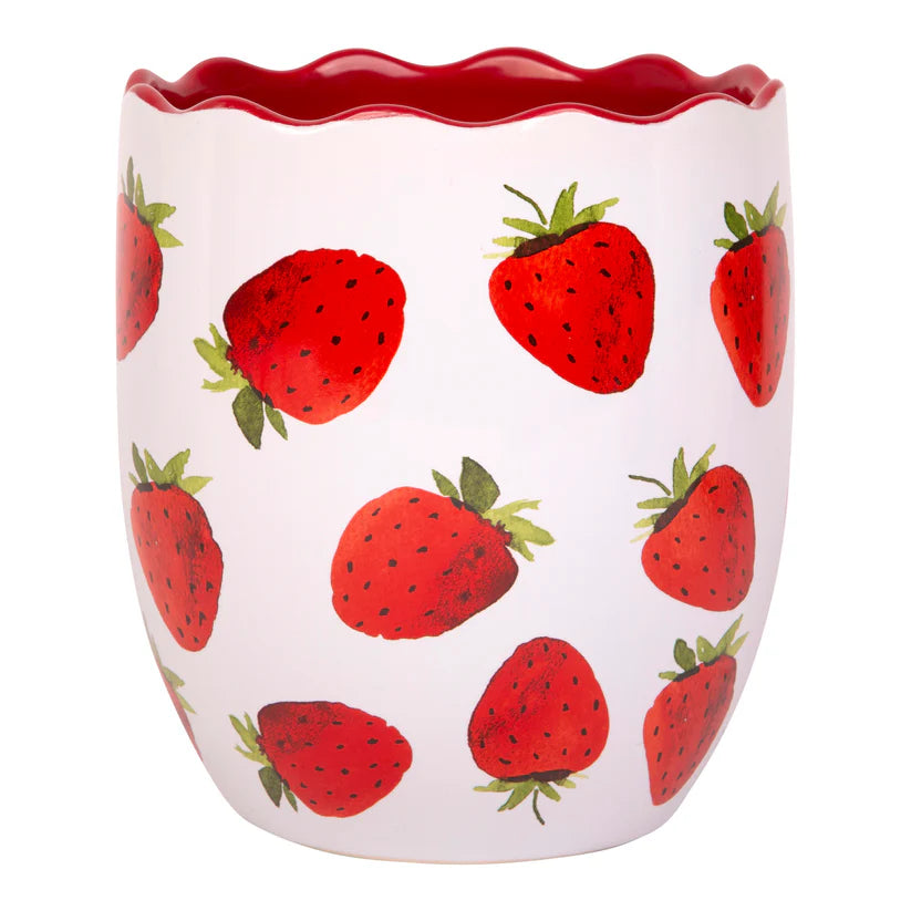White utensil crock with red strawberry pattern on a white background