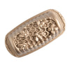 Bronze colored honeycomb textured loaf pan on a white background