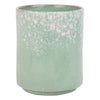 Aqua blue utensil crock with white accents on a white background