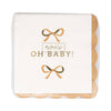 Packaged napkins with 'OH BABY!' text and gold bows on a white background