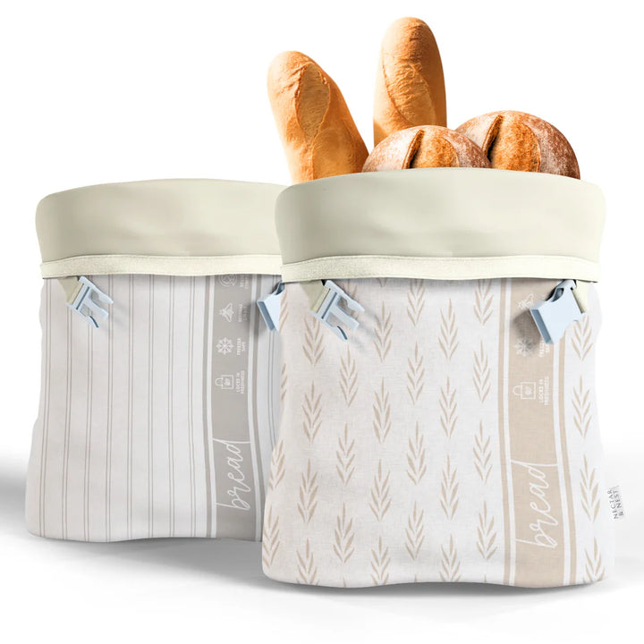 Bread basket with patterned design containing bread loaves on a white background