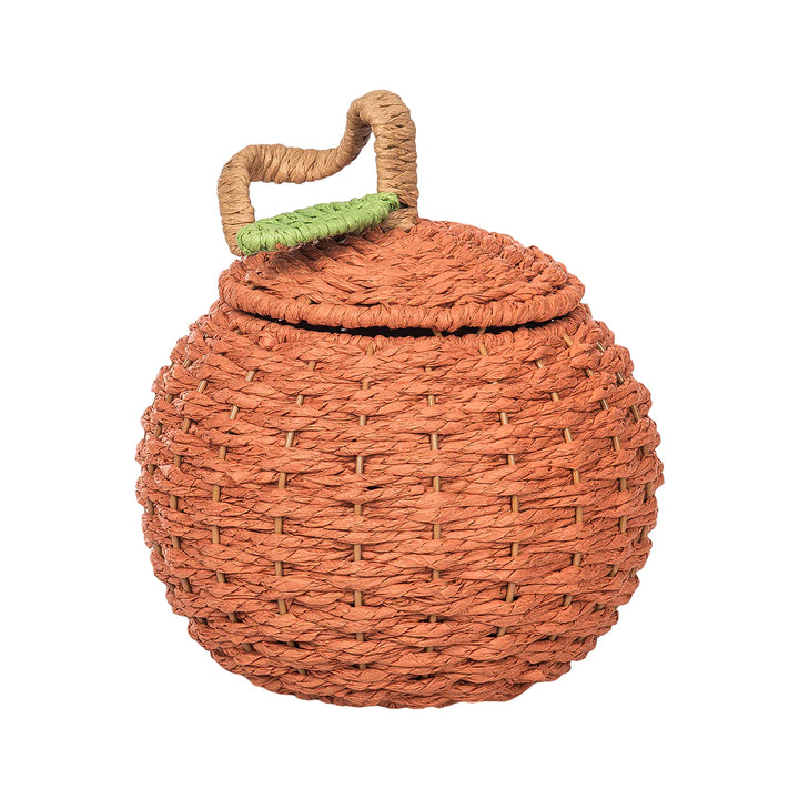 Woven basket designed like a pumpkin with a green leaf on a white background