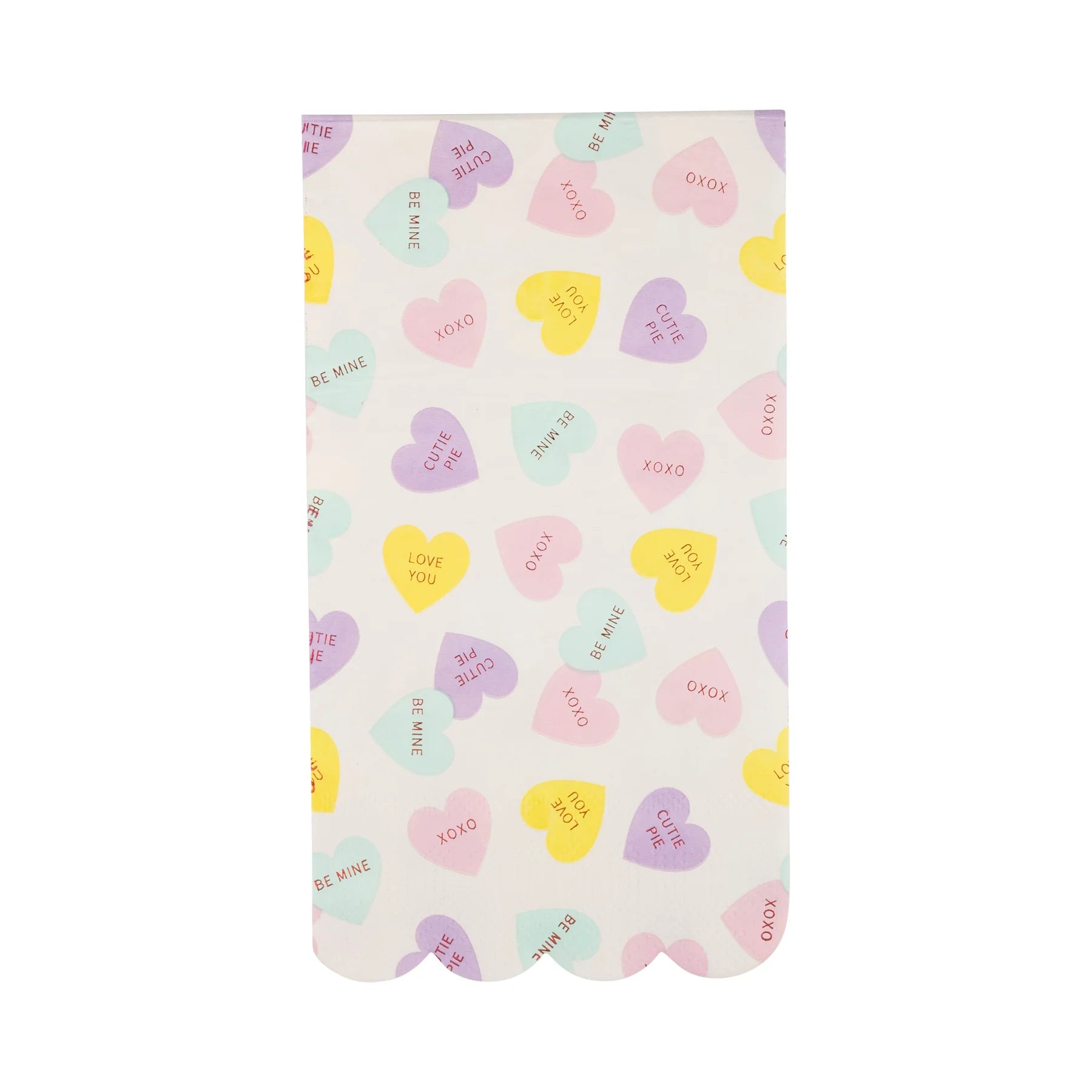 Paper napkin with pastel conversation hearts on a white background