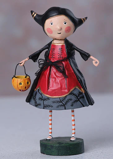 Halloween-themed figurine of a girl in a red dress with a black cape, holding a pumpkin basket.