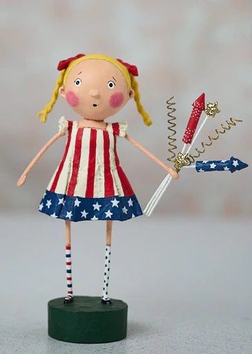 Patriotic figurine with American flag dress holding a bouquet of fireworks on a gray background