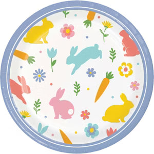 Round paper plate with colorful bunny and flower pattern on a white background
