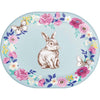 Decorative paper plate with a rabbit illustration and floral wreath on a light blue background
