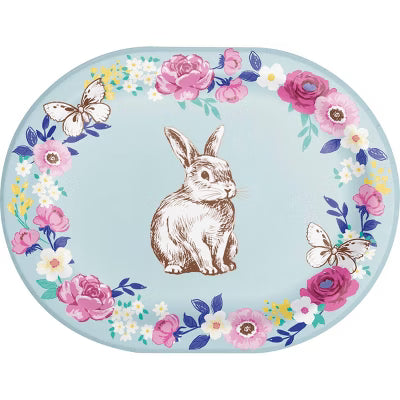 Decorative paper plate with a rabbit illustration and floral wreath on a light blue background