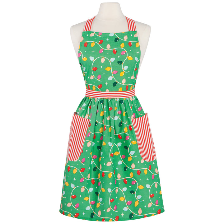 Green apron with colorful light bulb pattern on a white background