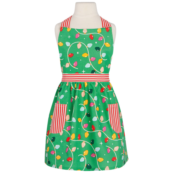 Green apron with colorful Christmas light pattern on a mannequin against a white background