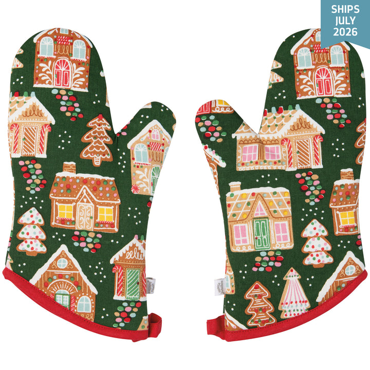 Oven mitts with gingerbread house pattern on a green background