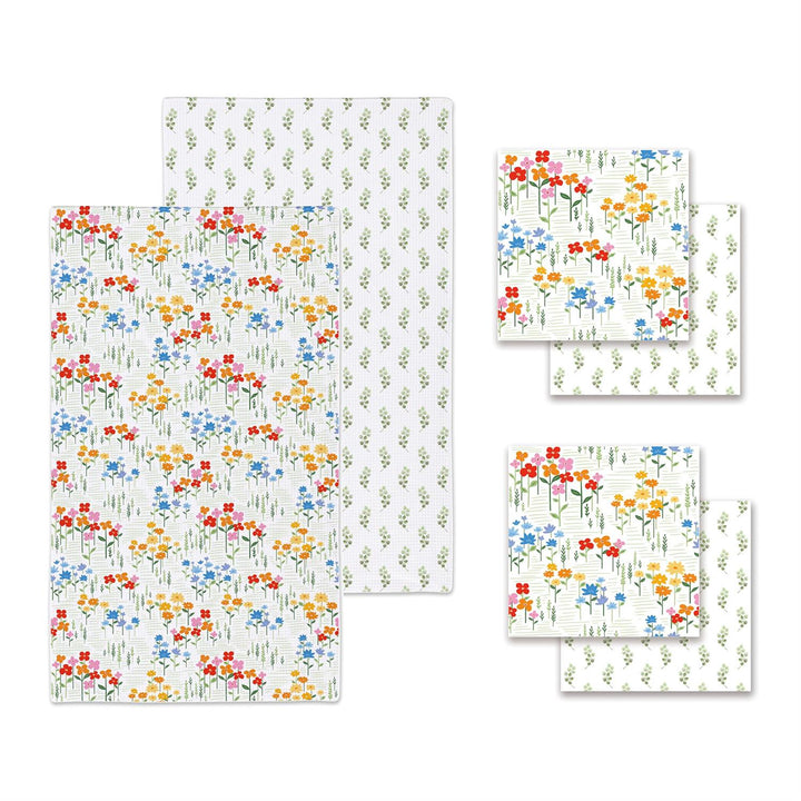 Set of floral-patterned kitchen towels and washcloths on a white background