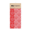 Red and white print kitchen towels with cardboard hanger on a white background.