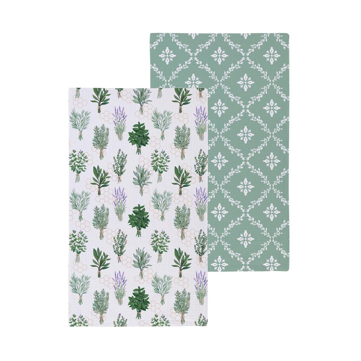 Two patterned towels with botanical designs on a white background