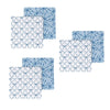 Set of blue and white patterned dish cloth squares on a white background