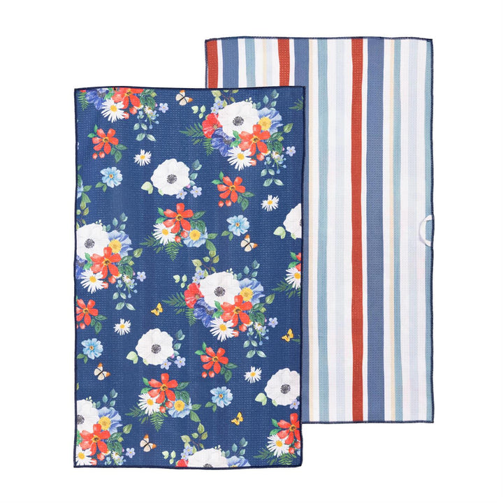 Double sided kitchen towel, one floral and one striped, on a white background