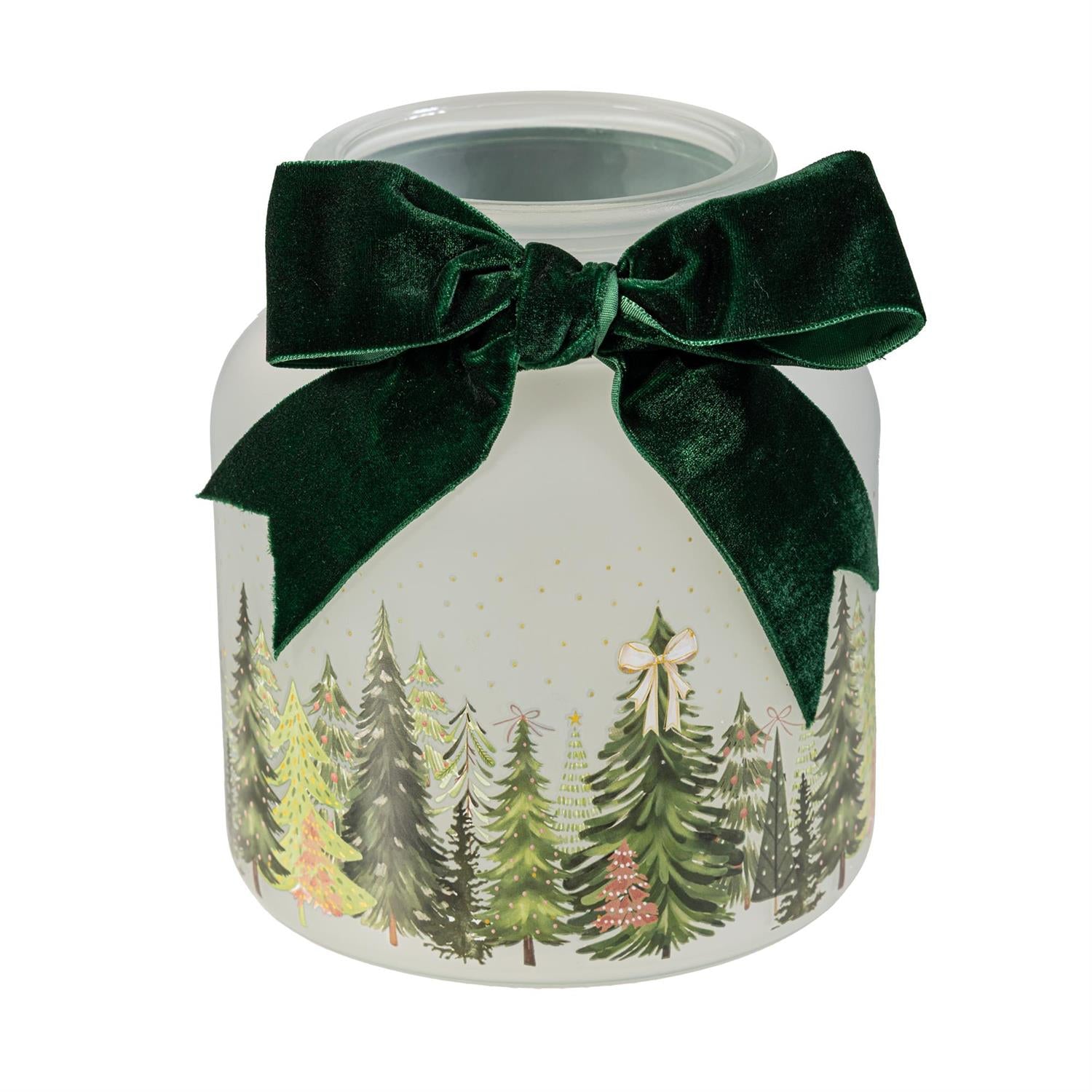 Decorative jar with a forest design and a green bow on a white background