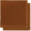 Chestnut ripple dish cloths on a white background.