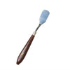 Spatula with metal blade and wooden handle on a white background