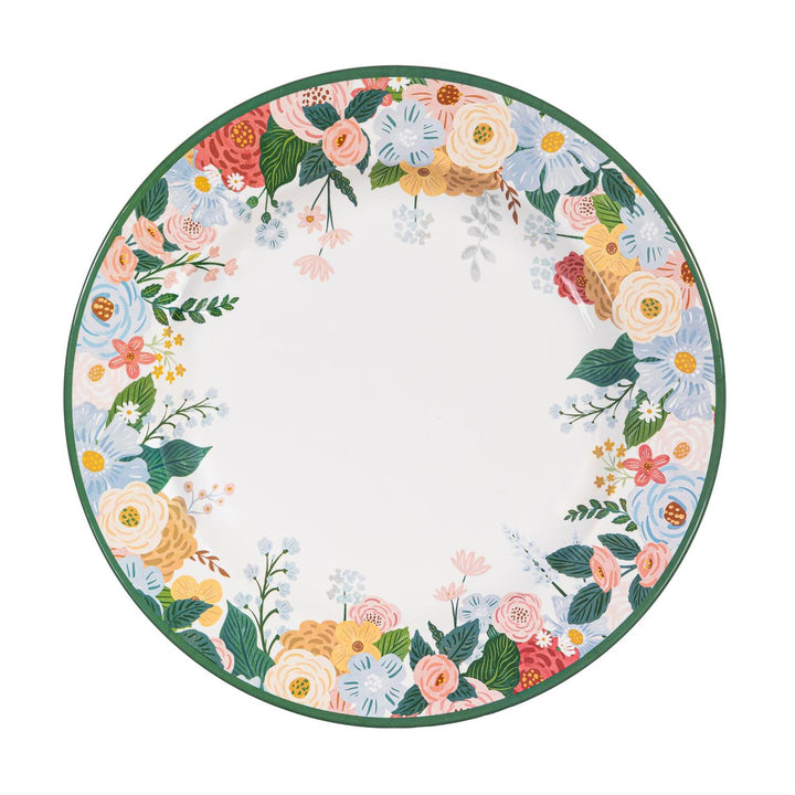 A round plate with flowers of various colors on a white background.