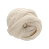 Balled up cream-colored soup sock on a white background