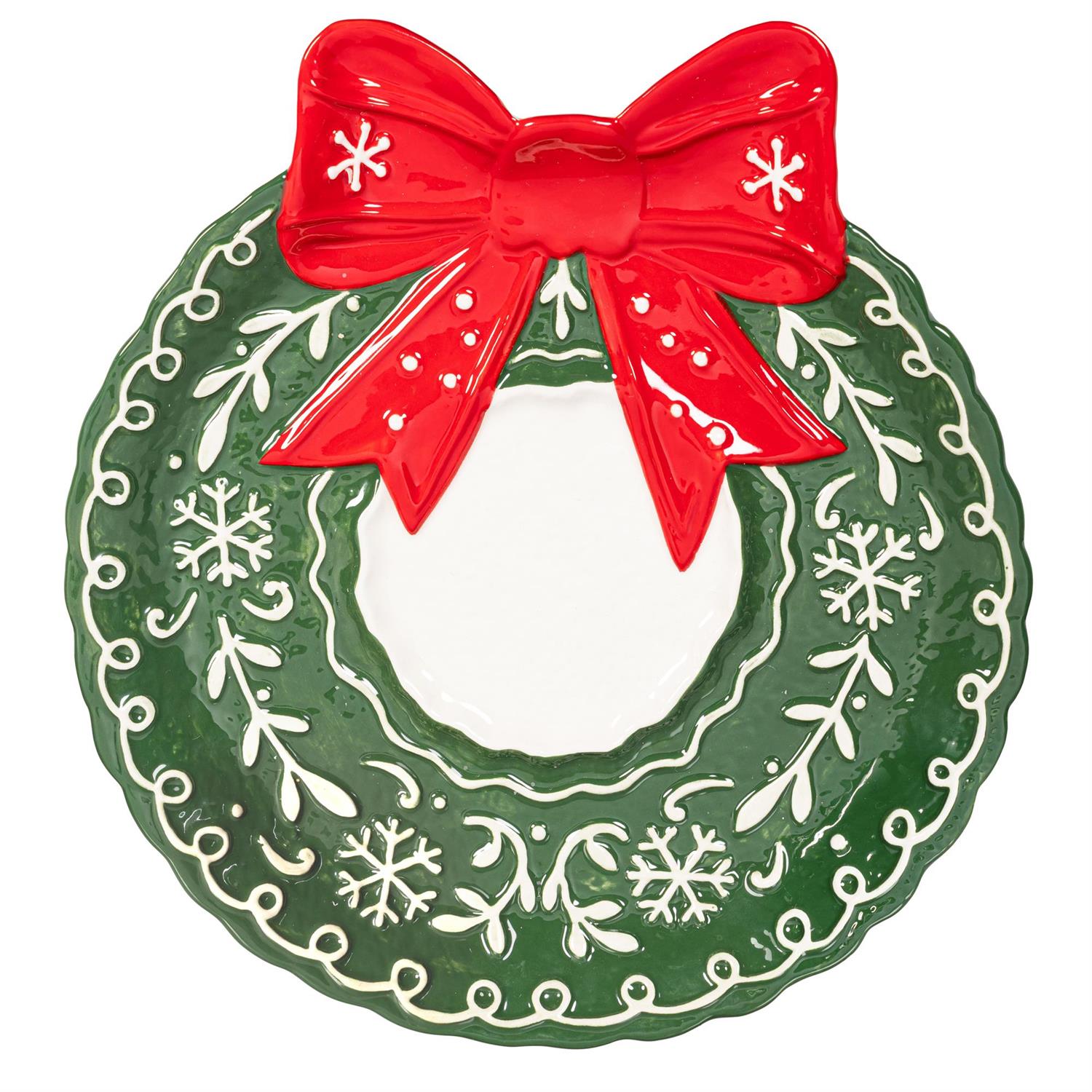 Decorative plate shaped like a Christmas wreath with a red bow on a white background