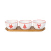 Three white bowls with red rim and Christmas-themed designs on a wooden tray.