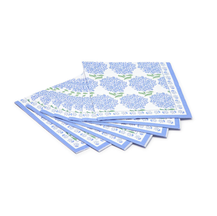 Set of blue floral patterned napkins on a white background