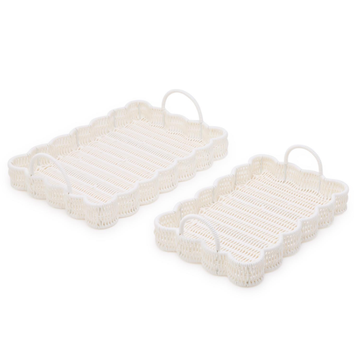 Two beige baskets with white handles on a white background