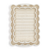 Wicker basket trays stacked together with scalloped edges on a white background