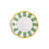 Decorative plate with green and yellow pattern on a white background