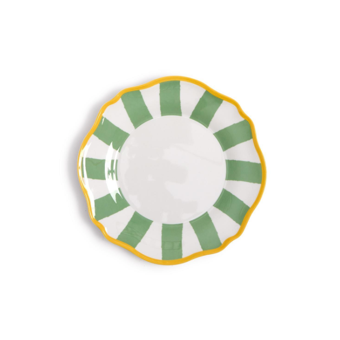Decorative plate with green and yellow pattern on a white background
