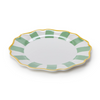 Decorative plate with green and yellow rim on a white background