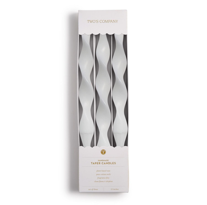 Three white twisted candles in a white box with 'Two's Company' branding on a white background.