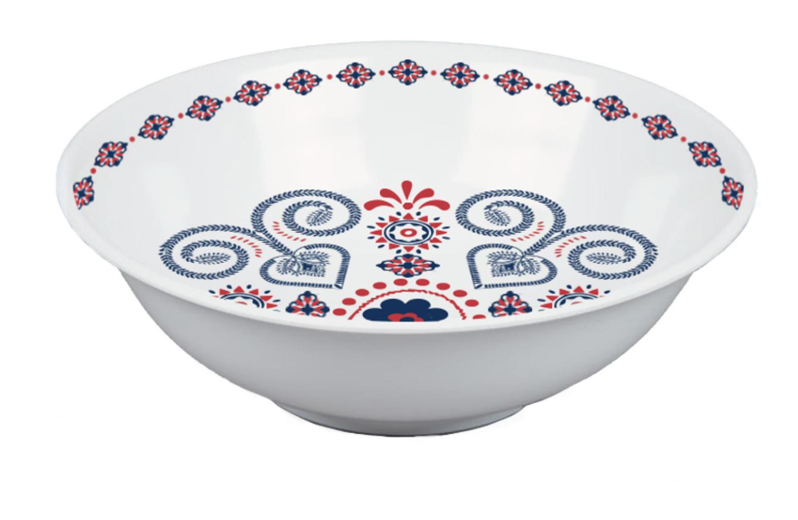 White bowl with blue and red floral patterns on a white background