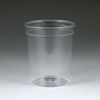 Clear plastic cup on a gray background