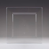 Clear square plastic plate on a dark background