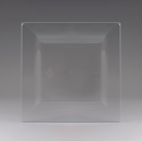 Clear plastic square plate on a gray background