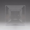 Clear square plastic bowl on a gray background