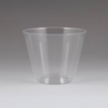 Clear plastic cup on a gray background